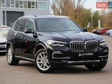 Черный БМВ Х5, объемом двигателя 3 л и пробегом 174 тыс. км за 49500 $, фото 1 на Automoto.ua