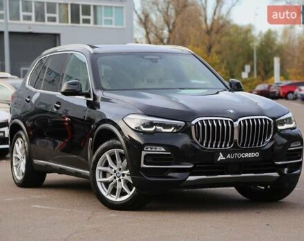 Черный БМВ Х5, объемом двигателя 3 л и пробегом 174 тыс. км за 49500 $, фото 1 на Automoto.ua