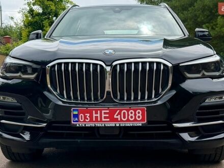 Черный БМВ Х5, объемом двигателя 3 л и пробегом 160 тыс. км за 46800 $, фото 1 на Automoto.ua