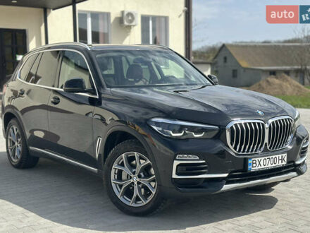 Черный БМВ Х5, объемом двигателя 2 л и пробегом 71 тыс. км за 54500 $, фото 1 на Automoto.ua