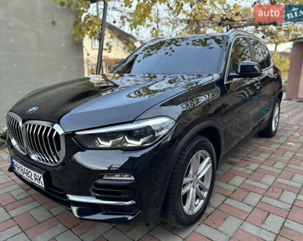 Черный БМВ Х5, объемом двигателя 3 л и пробегом 48 тыс. км за 62999 $, фото 1 на Automoto.ua