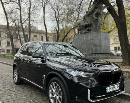 Черный БМВ Х5, объемом двигателя 3 л и пробегом 22 тыс. км за 80500 $, фото 1 на Automoto.ua
