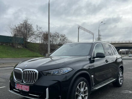 Черный БМВ Х5, объемом двигателя 3 л и пробегом 41 тыс. км за 92500 $, фото 1 на Automoto.ua