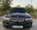 Фиолетовый БМВ Х5, объемом двигателя 3 л и пробегом 360 тыс. км за 5900 $, фото 1 на Automoto.ua