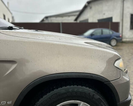 Коричневый БМВ Х5, объемом двигателя 3 л и пробегом 318 тыс. км за 9850 $, фото 18 на Automoto.ua