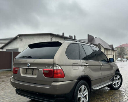 Коричневый БМВ Х5, объемом двигателя 3 л и пробегом 318 тыс. км за 9850 $, фото 2 на Automoto.ua