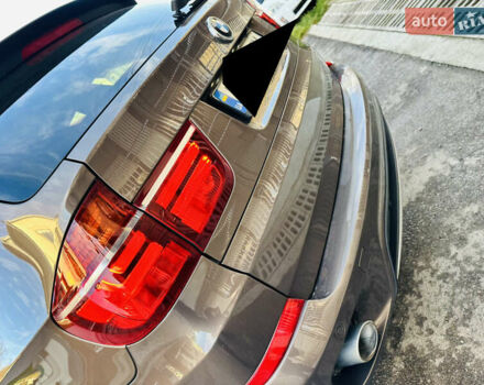 Коричневый БМВ Х5, объемом двигателя 3 л и пробегом 227 тыс. км за 15700 $, фото 5 на Automoto.ua