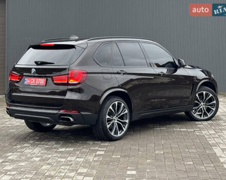 Коричневый БМВ Х5, объемом двигателя 3 л и пробегом 259 тыс. км за 33333 $, фото 12 на Automoto.ua