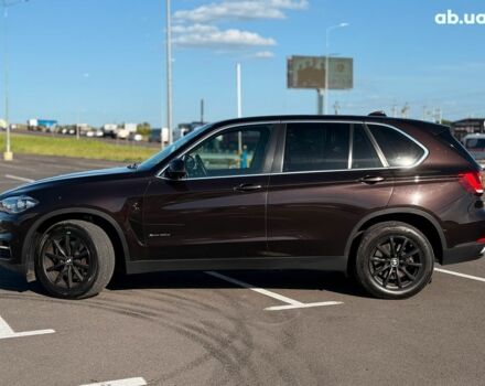 Коричневый БМВ Х5, объемом двигателя 3 л и пробегом 249 тыс. км за 28490 $, фото 4 на Automoto.ua