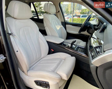 Коричневий БМВ Х5, об'ємом двигуна 4.4 л та пробігом 70 тис. км за 28100 $, фото 16 на Automoto.ua