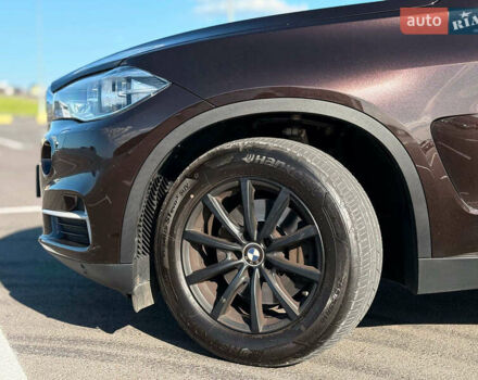 Коричневый БМВ Х5, объемом двигателя 3 л и пробегом 249 тыс. км за 27800 $, фото 2 на Automoto.ua
