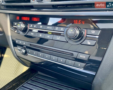 Коричневий БМВ Х5, об'ємом двигуна 4.4 л та пробігом 70 тис. км за 28100 $, фото 14 на Automoto.ua