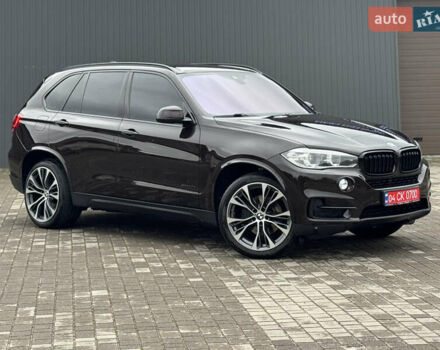Коричневый БМВ Х5, объемом двигателя 3 л и пробегом 259 тыс. км за 33333 $, фото 6 на Automoto.ua