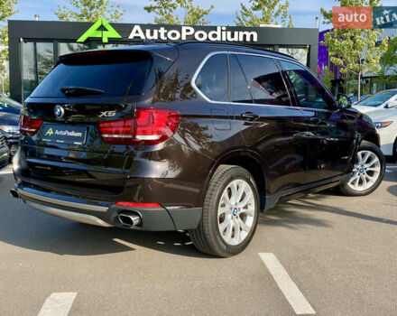 Коричневий БМВ Х5, об'ємом двигуна 4.4 л та пробігом 70 тис. км за 28100 $, фото 3 на Automoto.ua