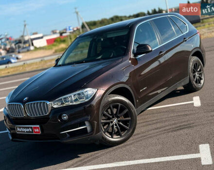 Коричневый БМВ Х5, объемом двигателя 3 л и пробегом 249 тыс. км за 27800 $, фото 1 на Automoto.ua