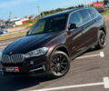 Коричневый БМВ Х5, объемом двигателя 3 л и пробегом 249 тыс. км за 27800 $, фото 1 на Automoto.ua