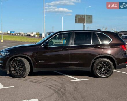 Коричневый БМВ Х5, объемом двигателя 3 л и пробегом 249 тыс. км за 27800 $, фото 4 на Automoto.ua