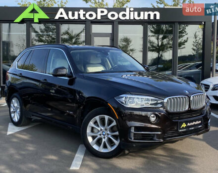 Коричневий БМВ Х5, об'ємом двигуна 4.4 л та пробігом 70 тис. км за 28100 $, фото 2 на Automoto.ua