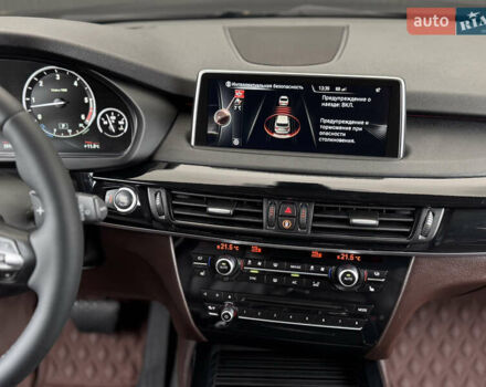 Коричневый БМВ Х5, объемом двигателя 3 л и пробегом 259 тыс. км за 33333 $, фото 32 на Automoto.ua