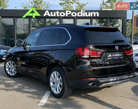 Коричневий БМВ Х5, об'ємом двигуна 4.4 л та пробігом 70 тис. км за 28100 $, фото 5 на Automoto.ua