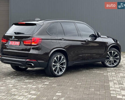 Коричневый БМВ Х5, объемом двигателя 3 л и пробегом 259 тыс. км за 33333 $, фото 13 на Automoto.ua