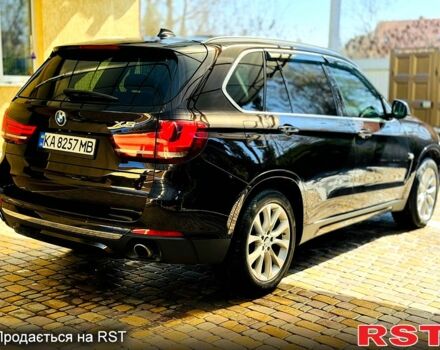 Коричневый БМВ Х5, объемом двигателя 3 л и пробегом 125 тыс. км за 22700 $, фото 3 на Automoto.ua