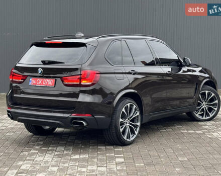 Коричневый БМВ Х5, объемом двигателя 3 л и пробегом 259 тыс. км за 33333 $, фото 11 на Automoto.ua