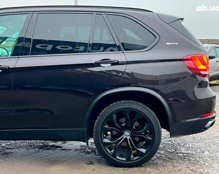 Коричневый БМВ Х5, объемом двигателя 2 л и пробегом 172 тыс. км за 34000 $, фото 4 на Automoto.ua