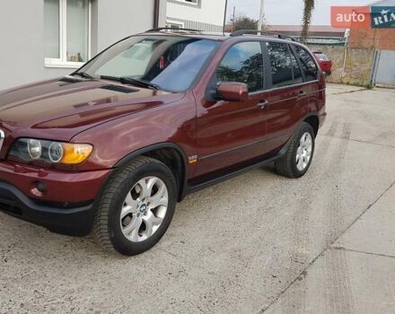 Красный БМВ Х5, объемом двигателя 2.93 л и пробегом 395 тыс. км за 7750 $, фото 5 на Automoto.ua