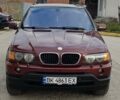 Красный БМВ Х5, объемом двигателя 2.93 л и пробегом 395 тыс. км за 7750 $, фото 1 на Automoto.ua
