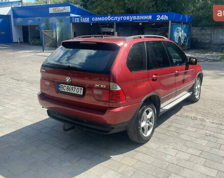 Красный БМВ Х5, объемом двигателя 3 л и пробегом 331 тыс. км за 7600 $, фото 3 на Automoto.ua