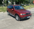 Красный БМВ Х5, объемом двигателя 3 л и пробегом 331 тыс. км за 7600 $, фото 7 на Automoto.ua