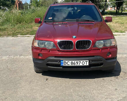 Красный БМВ Х5, объемом двигателя 3 л и пробегом 331 тыс. км за 7600 $, фото 1 на Automoto.ua