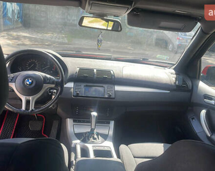 Красный БМВ Х5, объемом двигателя 3 л и пробегом 331 тыс. км за 8100 $, фото 12 на Automoto.ua