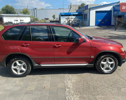 Красный БМВ Х5, объемом двигателя 3 л и пробегом 331 тыс. км за 8100 $, фото 2 на Automoto.ua