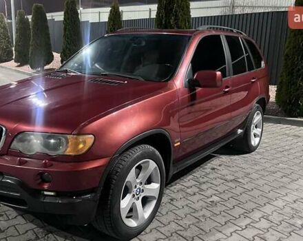 Красный БМВ Х5, объемом двигателя 3 л и пробегом 340 тыс. км за 6500 $, фото 3 на Automoto.ua