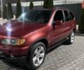 Красный БМВ Х5, объемом двигателя 3 л и пробегом 340 тыс. км за 6500 $, фото 3 на Automoto.ua