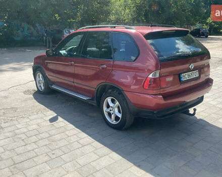 Красный БМВ Х5, объемом двигателя 3 л и пробегом 331 тыс. км за 7600 $, фото 5 на Automoto.ua