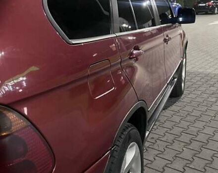 Красный БМВ Х5, объемом двигателя 3 л и пробегом 340 тыс. км за 6500 $, фото 5 на Automoto.ua