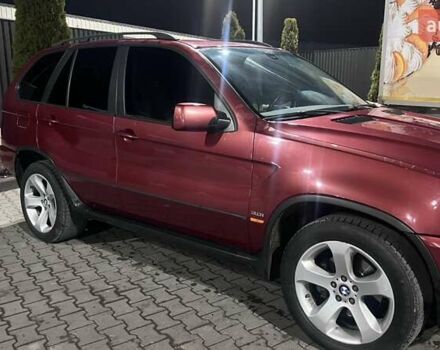 Красный БМВ Х5, объемом двигателя 3 л и пробегом 340 тыс. км за 6500 $, фото 2 на Automoto.ua