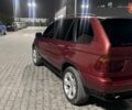 Красный БМВ Х5, объемом двигателя 3 л и пробегом 340 тыс. км за 6500 $, фото 4 на Automoto.ua
