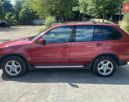 Красный БМВ Х5, объемом двигателя 3 л и пробегом 331 тыс. км за 8100 $, фото 6 на Automoto.ua