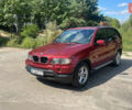 Красный БМВ Х5, объемом двигателя 3 л и пробегом 331 тыс. км за 7600 $, фото 1 на Automoto.ua
