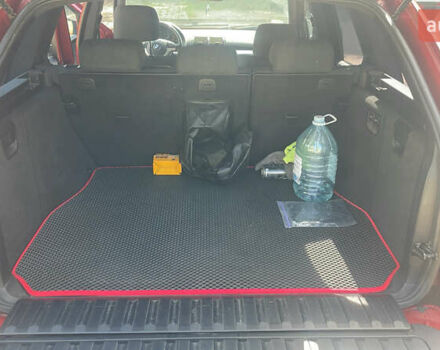 Красный БМВ Х5, объемом двигателя 3 л и пробегом 331 тыс. км за 8100 $, фото 10 на Automoto.ua