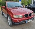 Красный БМВ Х5, объемом двигателя 3 л и пробегом 330 тыс. км за 7200 $, фото 1 на Automoto.ua