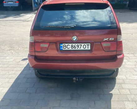 Красный БМВ Х5, объемом двигателя 3 л и пробегом 331 тыс. км за 8100 $, фото 4 на Automoto.ua