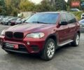Красный БМВ Х5, объемом двигателя 3 л и пробегом 309 тыс. км за 12390 $, фото 1 на Automoto.ua