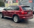 Красный БМВ Х5, объемом двигателя 3 л и пробегом 309 тыс. км за 12390 $, фото 7 на Automoto.ua