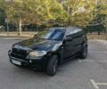 Красный БМВ Х5, объемом двигателя 4 л и пробегом 305 тыс. км за 16800 $, фото 1 на Automoto.ua