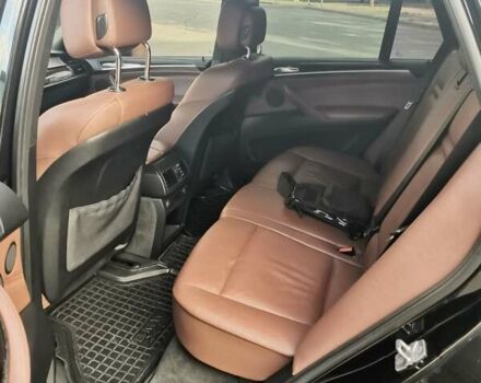 Красный БМВ Х5, объемом двигателя 4 л и пробегом 305 тыс. км за 16800 $, фото 1 на Automoto.ua